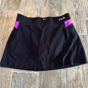 Fila Women's Mini skort in Black with Purple Accents